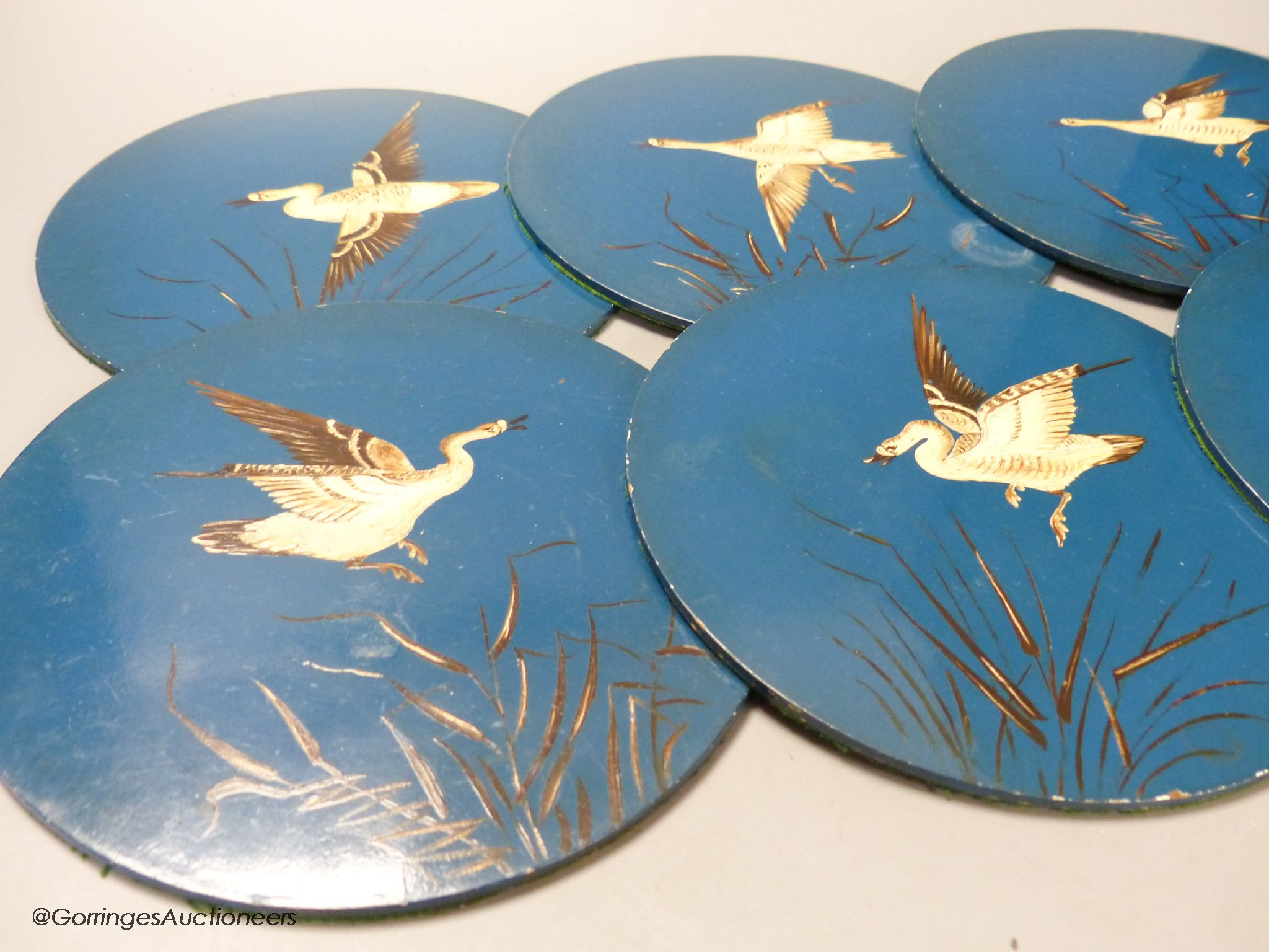 A set of six 'goose' painted coasters, diameter 20cm